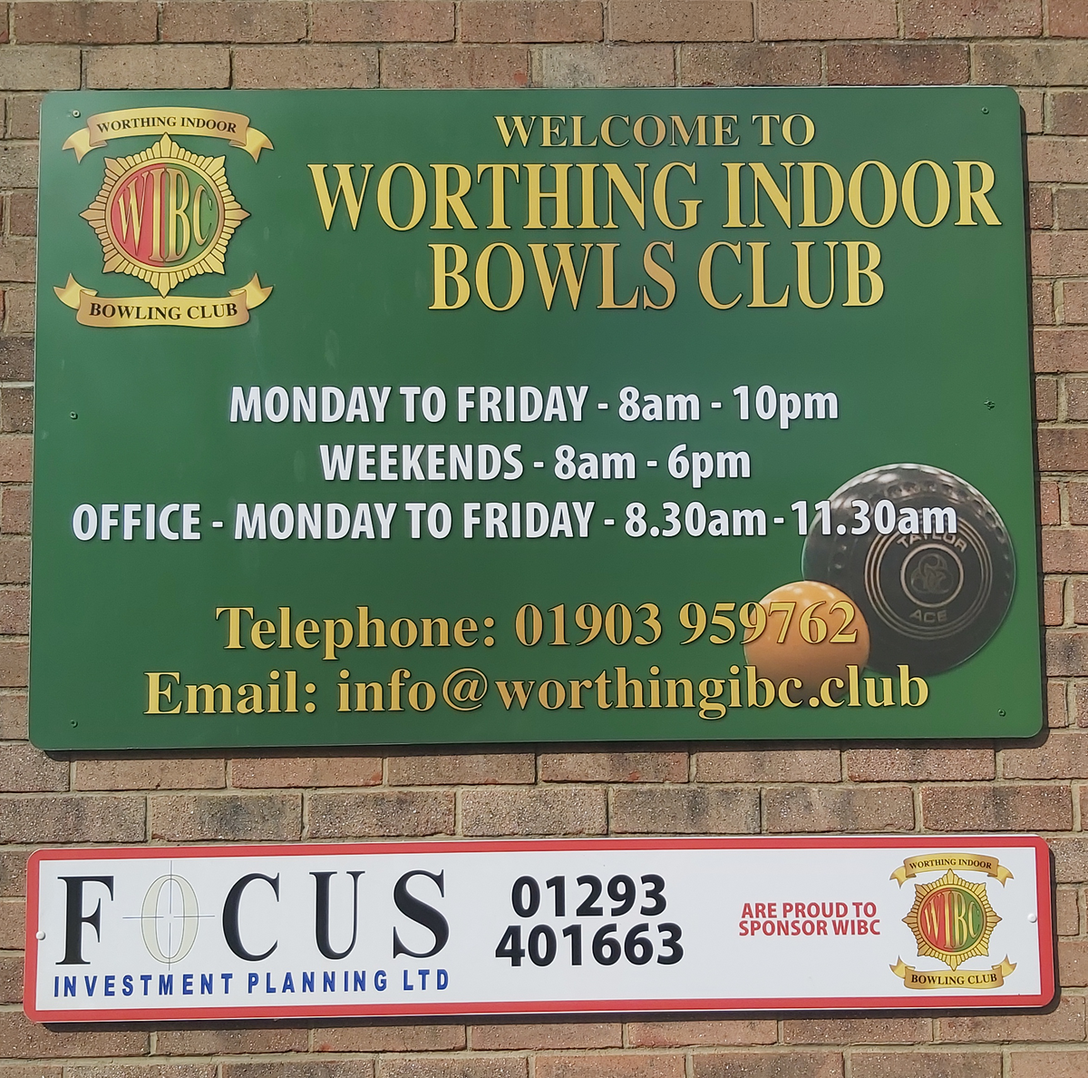 Worthing Indoor Bowls Club business signage mounted on an exterior brick wall