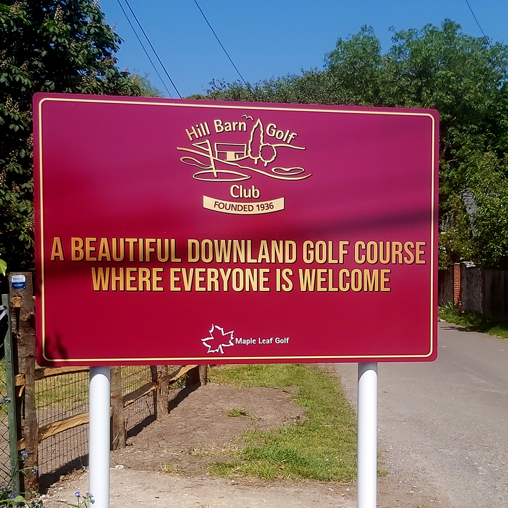 Hill Barn Golf Club roadside business sign installed on freestanding posts
