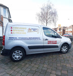 Self-fit vehicle graphics on a compact panel van